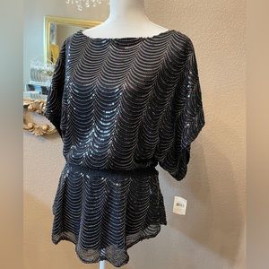 Large black sequence top